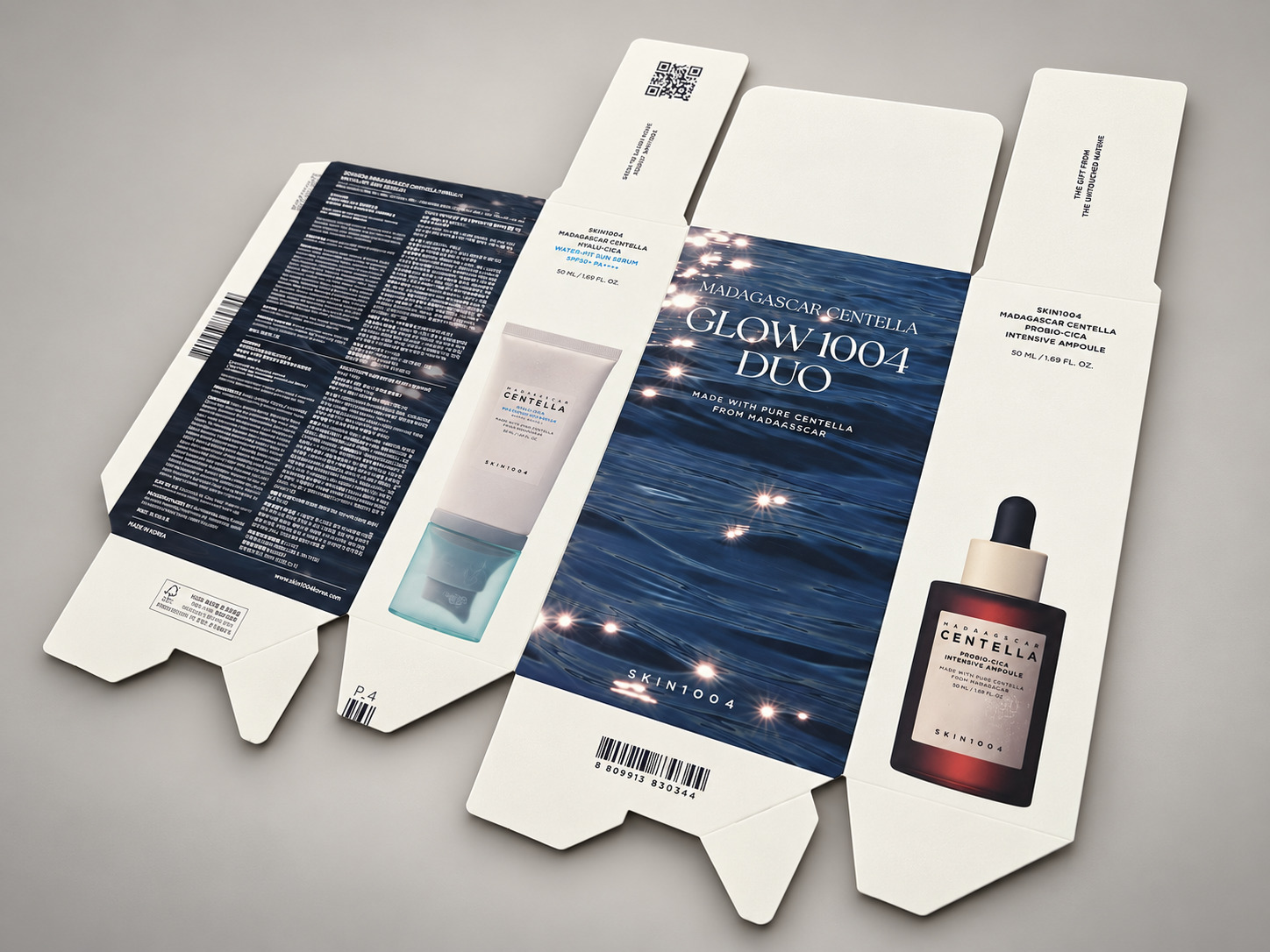 Glow1004 cosmetic cartons arranged as premium packaging samples